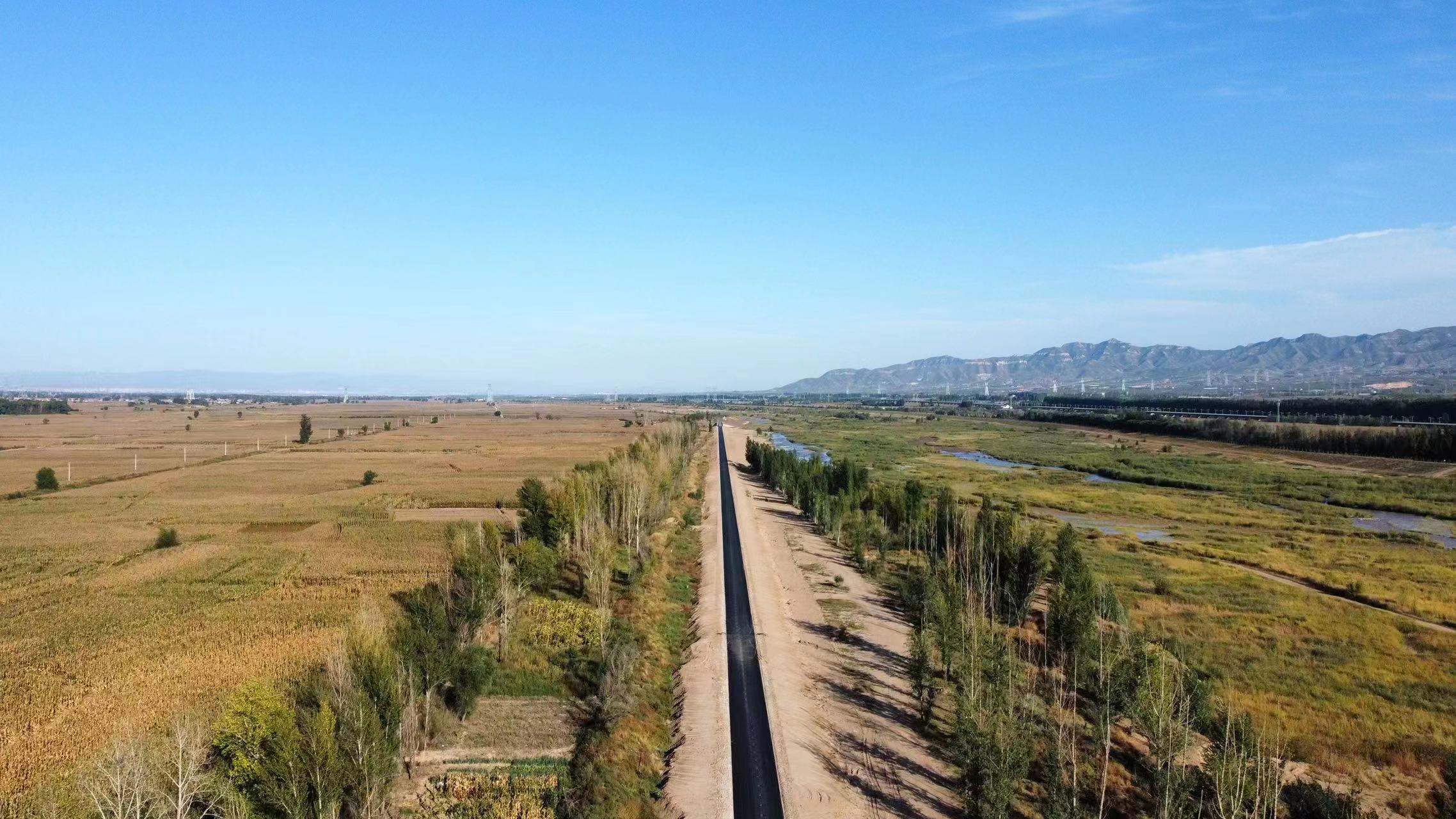 張家口洋河左岸堤頂路全線貫通 張家口洋河左岸堤頂路全線貫通